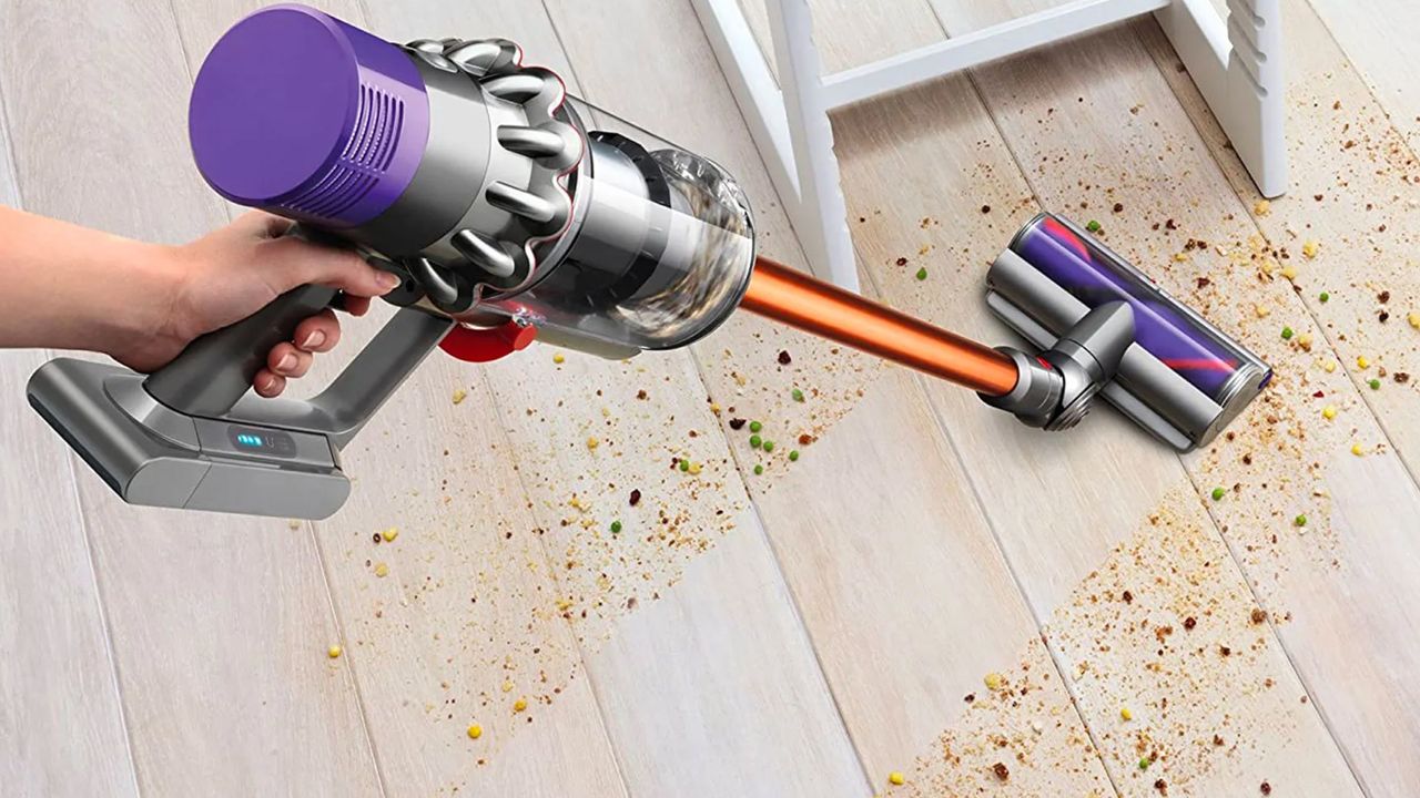 A Dyson vacuum cleaner used on a hardwood floor