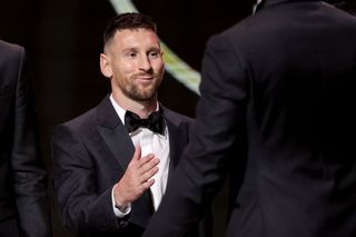 Inter Miami CF's Argentine forward Lionel Messi gestures on stage during the 2023 Ballon d'Or France Football award ceremony at the Theatre du Chatelet in Paris on October 30, 2023.