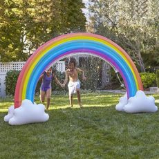 garden with inflatable rainbow sprinkler