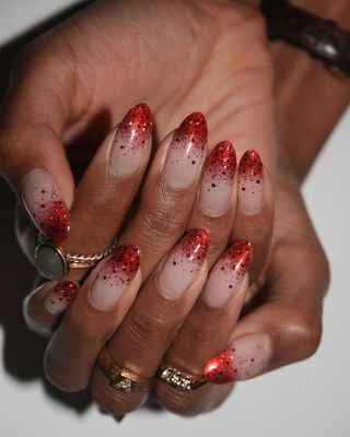 Sparkling red manicure by Imarni Nails