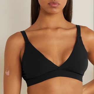 bras vs bralettes: a model wearing a black bralette