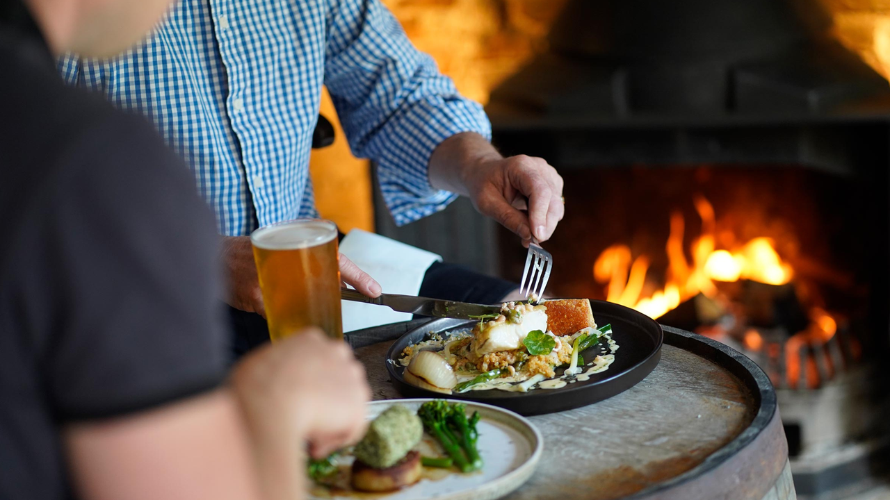 People dine at The Peacock Inn in Chelsworth