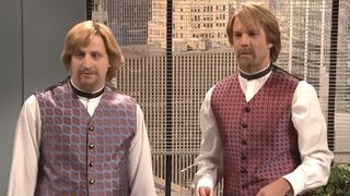 Tim Robinson and Jason Sudeikis wear sweater vests as they perform "Roundball Rock" on SNL.