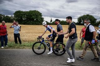 Team FDJ Suez Futuroscope Italian rider Marta Cavalli is helped of by Team members after a fall during the 2nd stage of the new edition of the Womens Tour de France cycling race 1364 km between Meaux and Provins on July 25 2022 Photo by JEFF PACHOUD AFP Photo by JEFF PACHOUDAFP via Getty Images