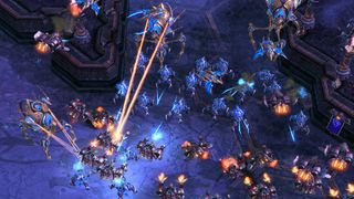 A StarCraft 2 battle with one army surrounding and shooting at another.