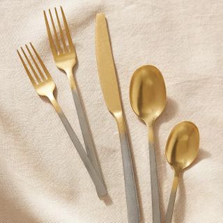 Silver handled, gold forks and spoons