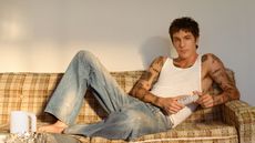 role model on a sofa