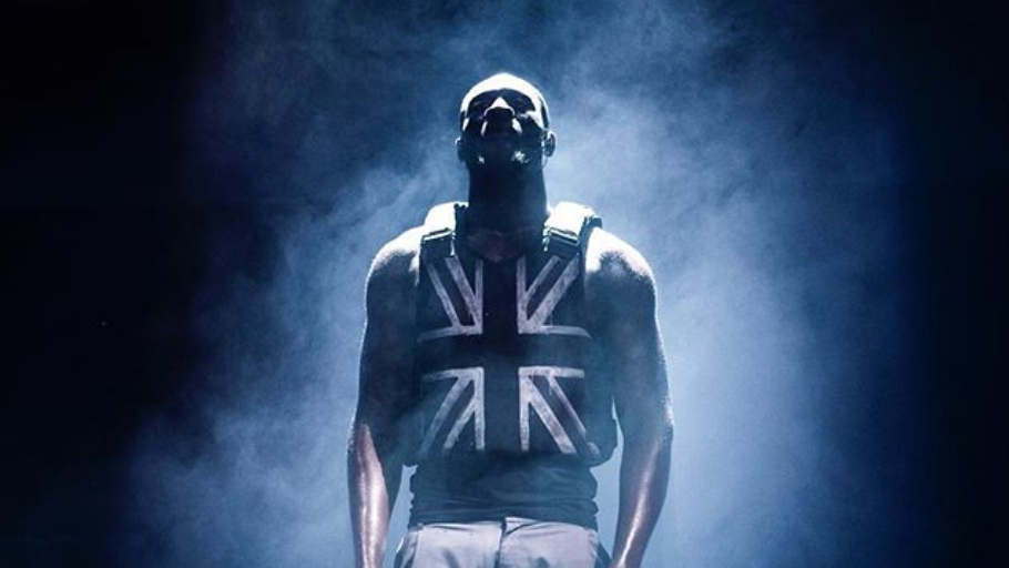 Stormzy performing in his Union Flag vest