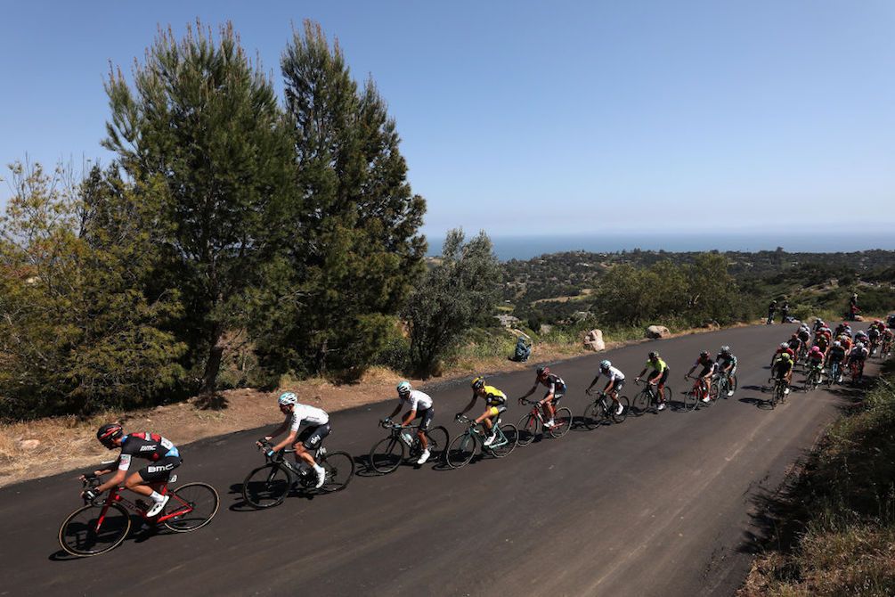 The main field is strung out on the lower slopes of Gibraltar Road on stage 2 of the 2018 Tour of California