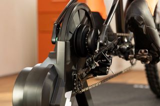 Image of Zwift Hub One trainer with close up of Cog