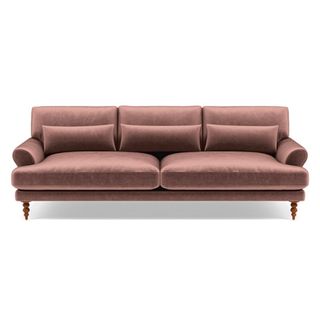 A blush velvet sofa