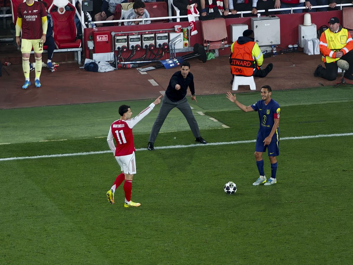 Action photos during a Champions League soccer match at Arsenal's Emirates stadium, taken with the Oppo Find X9 Ultra and teleconverter lens