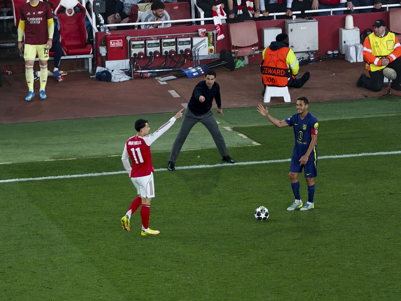Action photos during a Champions League soccer match at Arsenal's Emirates stadium, taken with the Oppo Find X9 Ultra and teleconverter lens