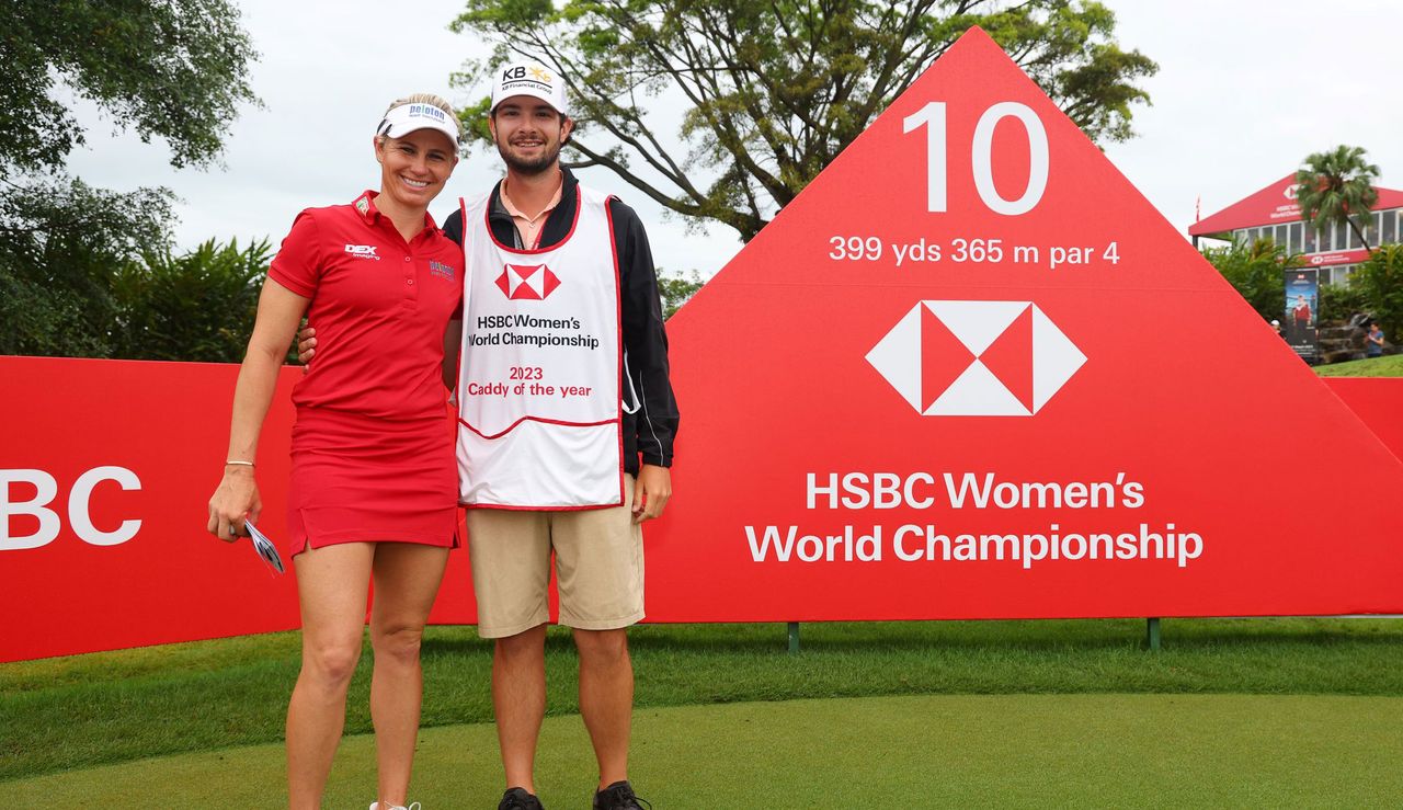 David Eller and Ryan O&#039;Toole celebrate the Caddy of the Year award at the HSBC Women&#039;s World Championship