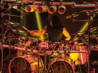 "Despite playing a reduced kit, Mike Mangini keeps time brilliantly."