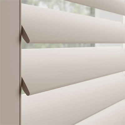 white wooden window shutters