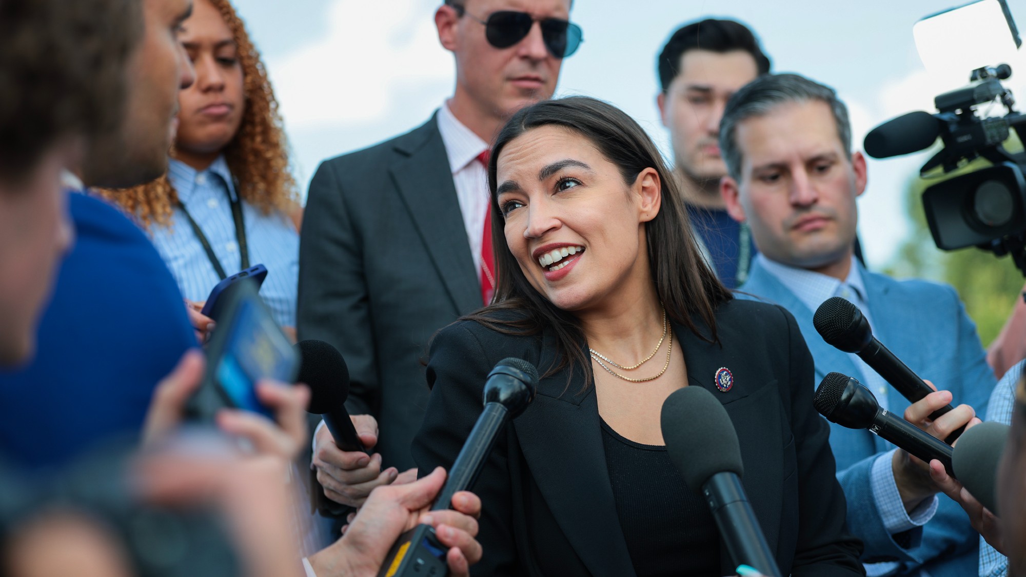 Alexandria Ocasio-Cortez speaks to reporters near the House steps at the US Capitol in Washington