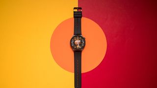Honor Watch 5 Ultra against colorful background
