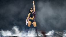 Charli XCX performs onstage at Glastonbury in 2025
