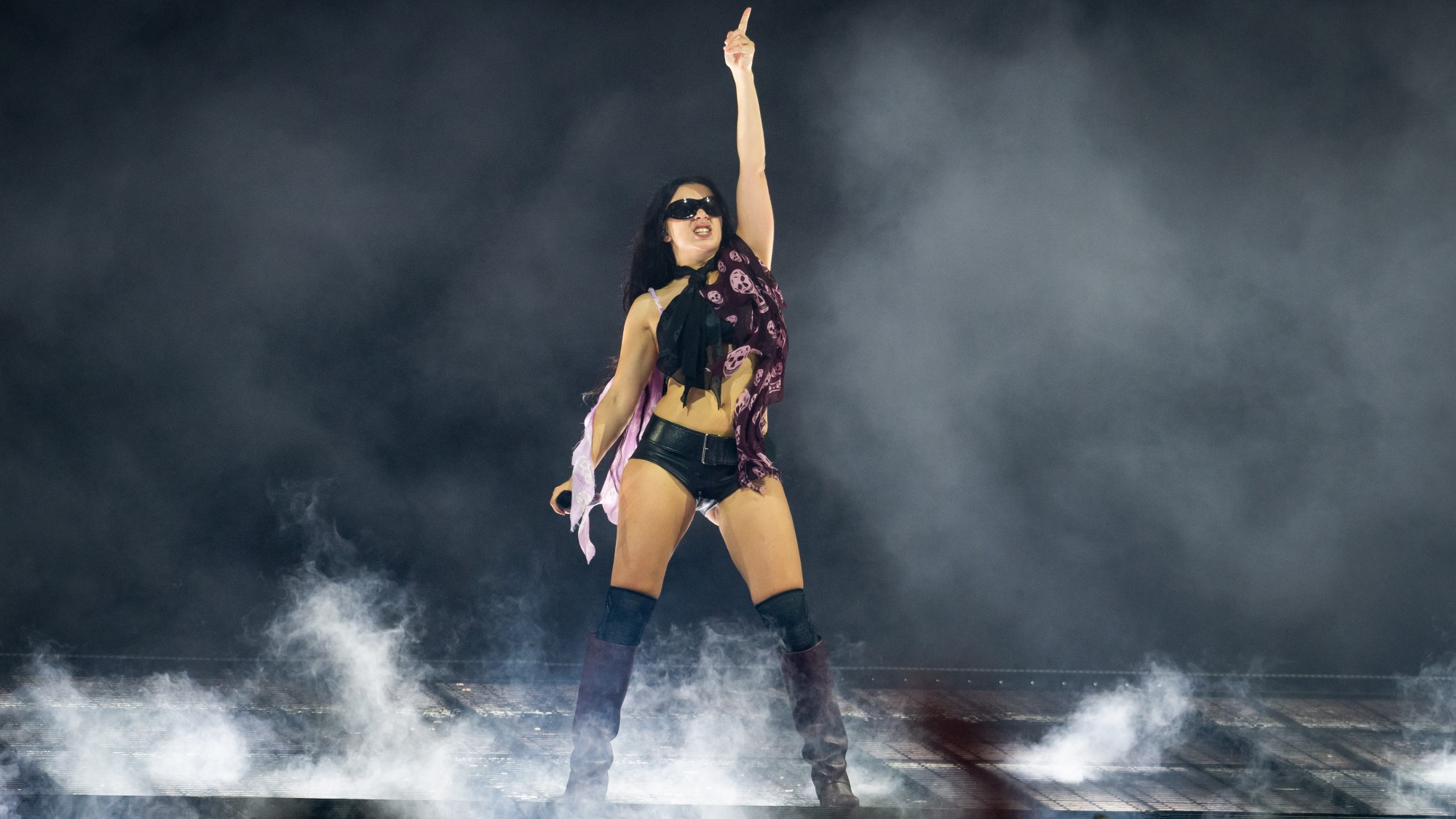 Charli XCX performs onstage at Glastonbury in 2025