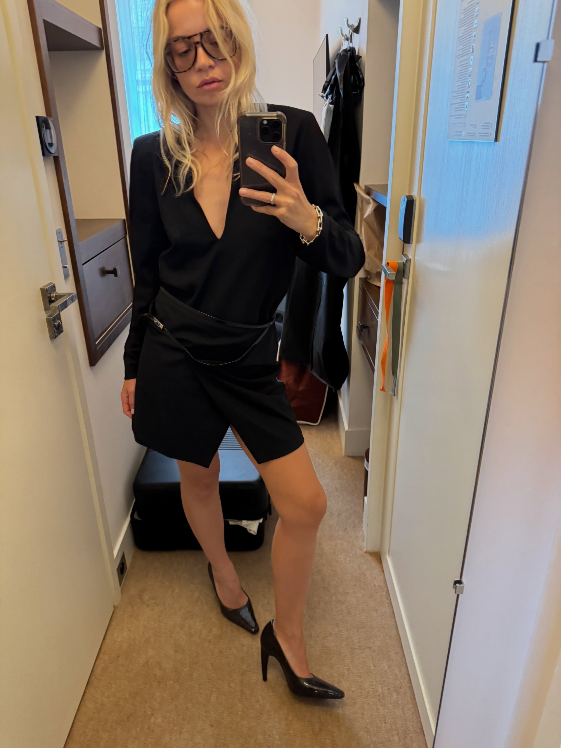 An image of a woman wearing skirt with slits outfit fall 2026