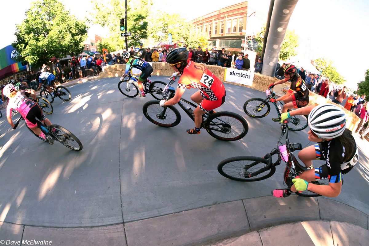 Racers pass through one of the many turns on the downtown course