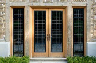 Wooden framed french doors with crittal style glazing