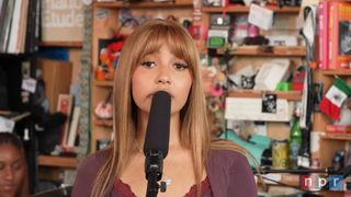 PinkPantheress at the mic for her tiny desk concert