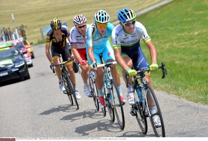 Home rider Michael Albasini leads the escapees