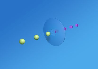 small green balls on one side of blue circle with purple blocks on the other