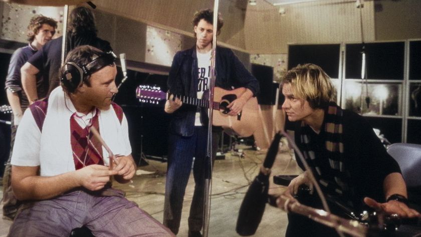 Bob Geldof strums a 12-string while Phil Collins and Sting chat during the making of &quot;Do They Know It&#039;s Christmas?,&quot; November 1984. 