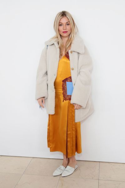 Clothing, White, Coat, Orange, Yellow, Trench coat, Outerwear, Overcoat, Street fashion, Fashion,