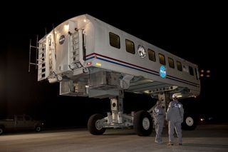 The crew members of space shuttle Endeavour's STS-134 mission undergo brief medical checks in the Crew Transport Vehicle before talking to media gathered on the Shuttle Landing Facility at NASA's Kennedy Space Center in Florida, on June 1, 2011.
