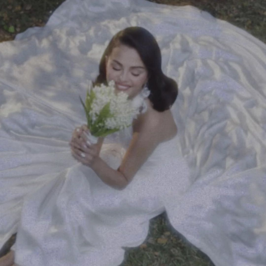 Selena Gomez wearing a white wedding dress