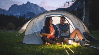 2-person tents: couple enjoying a camp