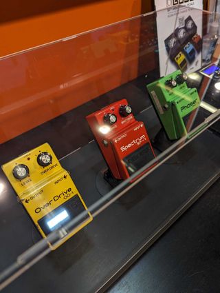 Three of Boss's original compact pedals, on display at the 2024 NAMM show