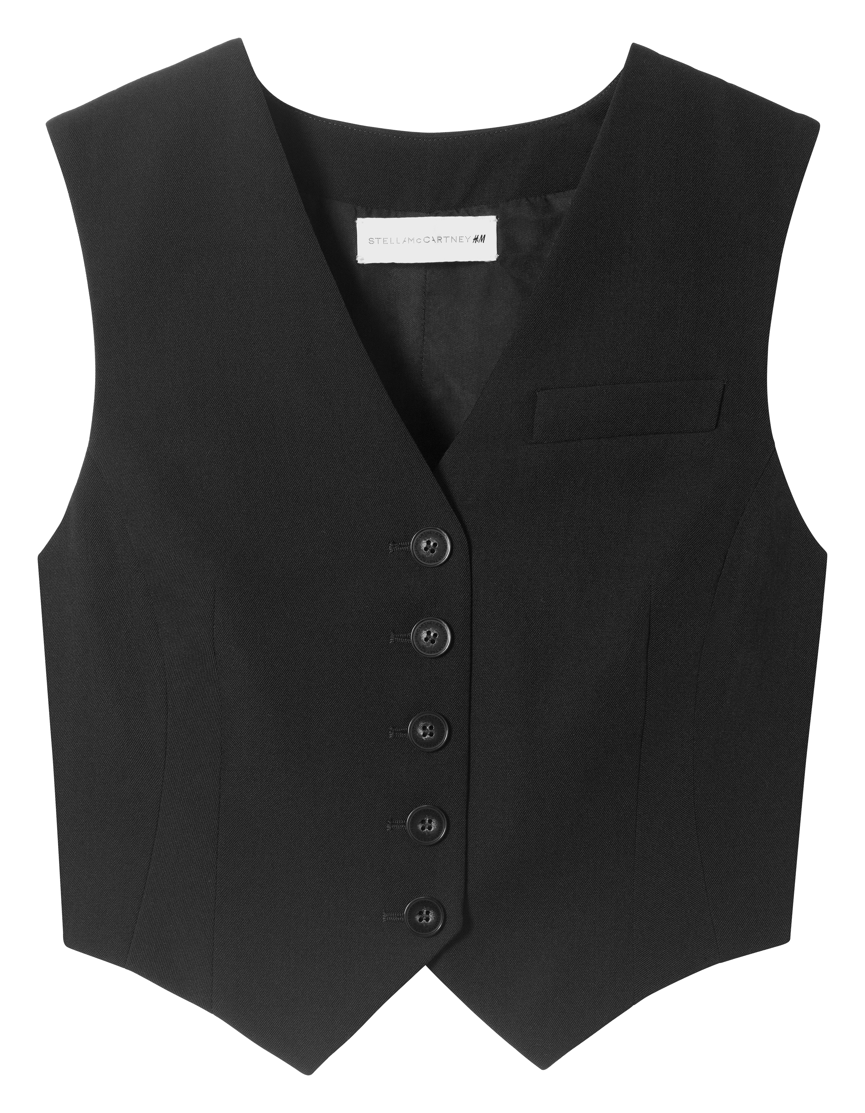 clothes from the H&M x Stella McCartney collaboration on a plain backdrop