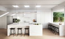 a white kitchen with an open window