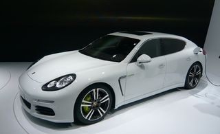 White Porsche Panamera e-Hybrid on display