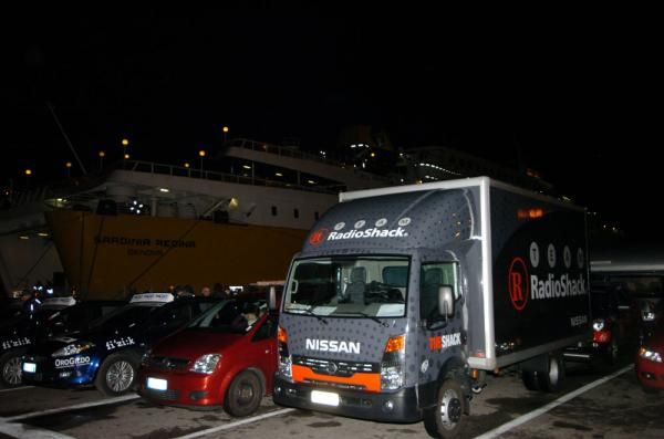 RadioShack's team truck waits to board the ferry on Sunday night in Livorgno