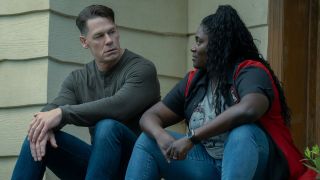 Christopher Smith (John Cena) and Leota Adebayo (Danielle Brooks) chat on Peacemaker