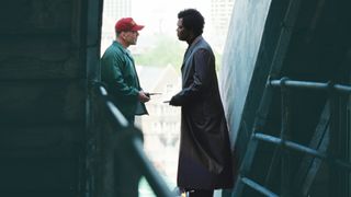 Bruce Willis as David Dunn and Samuel L. Jackson as Elijah Price in one of the best superhero movies, Unbreakable.