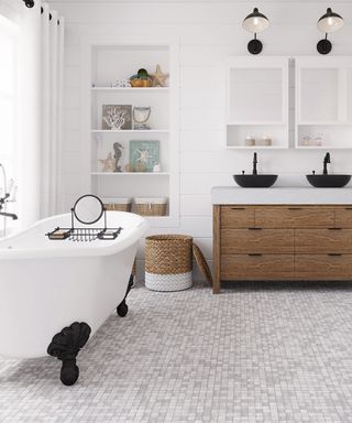 A tiled bathroom with freestanding bath and shelving