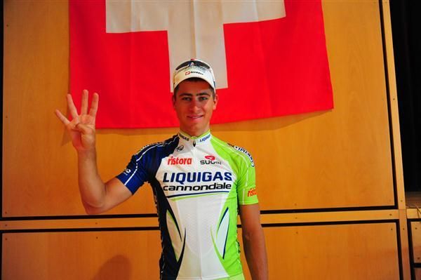 Four of the best: Sagan celebrates in front of the Swiss flag
