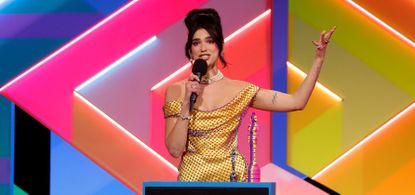 Dua Lipa Brits - Lipa receives the award for Best Female Solo Artist during The BRIT Awards 2021 at The O2 Arena