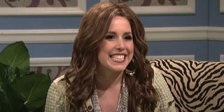 Vanessa Bayer smiling as Miley Cyrus on Saturday Night Live
