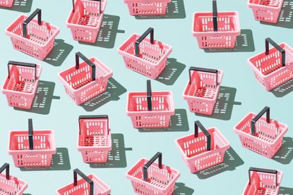 An image of many pink supermarket baskets on a blue background 