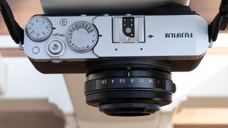 The Fujifilm X-E4 camera shot from above