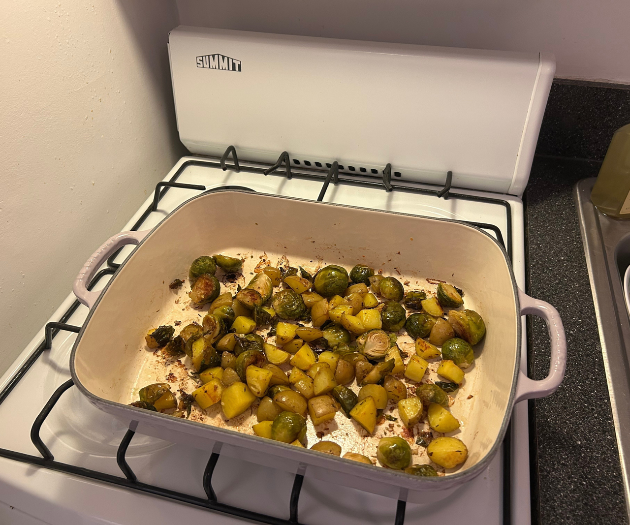 Le Creuset Signature Roaster with brussels sprouts and potatoes