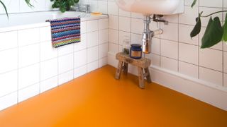 orange rubber floor in bathroom